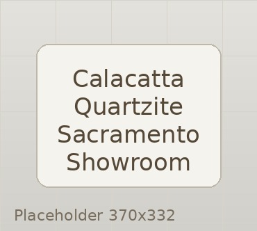 Showroom consultation comparing Calacatta quartzite with cabinet and tile samples