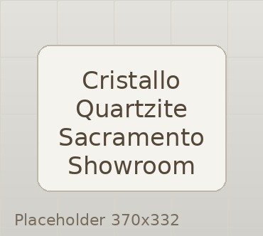 Designer comparing Cristallo quartzite slab options in Sacramento showroom