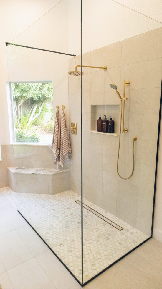 Vanity top and bathroom surface selection ideas including quartz and natural stone